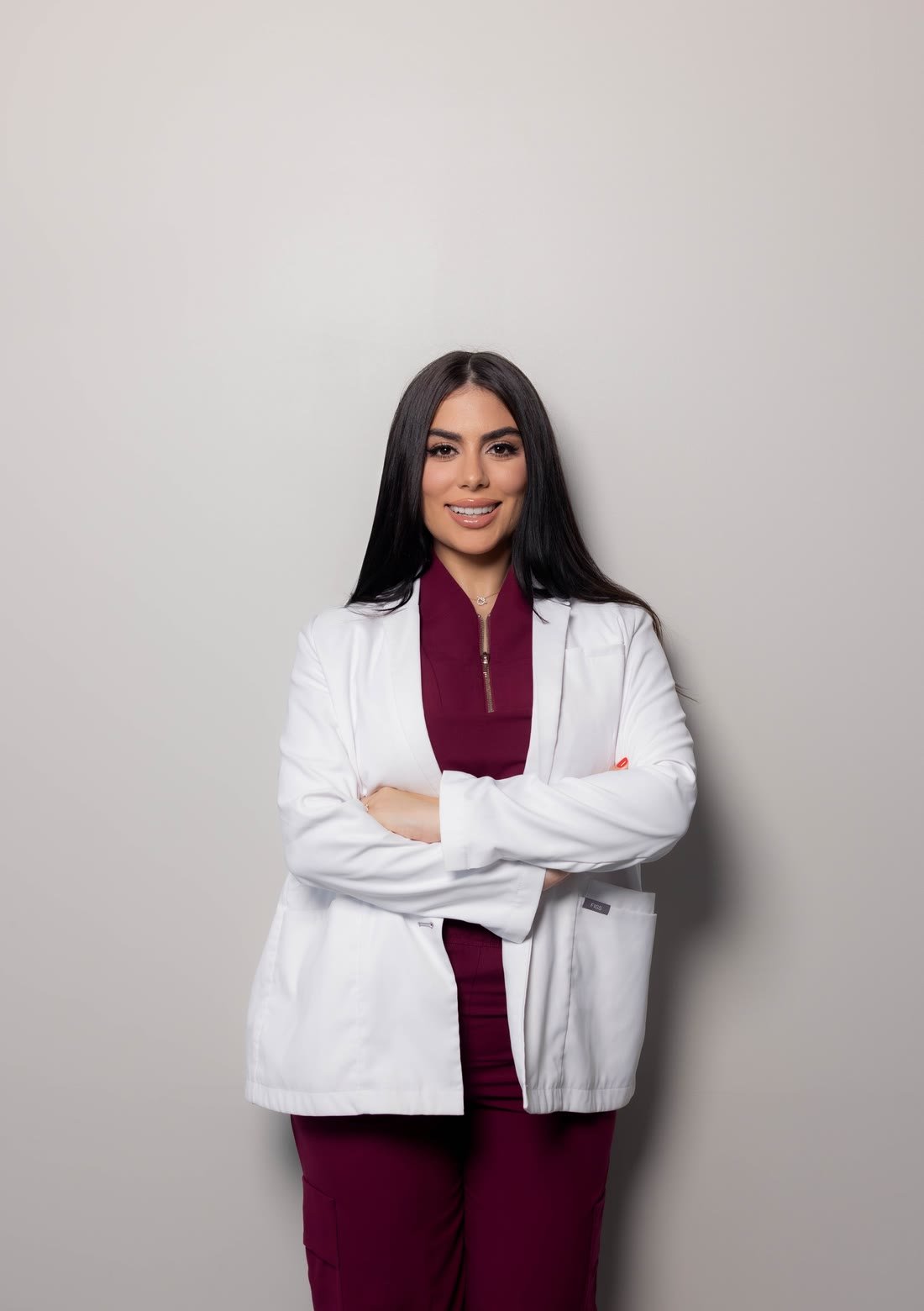 Cosmetic dentist in Pompano Beach reviewing a digital smile design with a patient